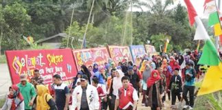 Hadiri HUT Desa, Bupati Rohul Terus Tingkatkan Pembangunan di Seluruh Desa
