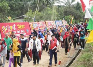 Hadiri HUT Desa, Bupati Rohul Terus Tingkatkan Pembangunan di Seluruh Desa