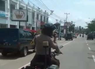 Gunakan Toa, Polres Rohul Keliling Kota Himbau Warga Antisipasi Virus Corona