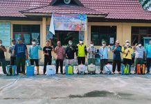 Cegah Covid-19, SMAN 1 Kepenuhan Semprot Desinfektan Diseluruh Area Sekolah