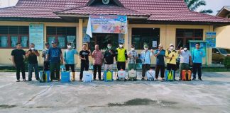 Cegah Covid-19, SMAN 1 Kepenuhan Semprot Desinfektan Diseluruh Area Sekolah