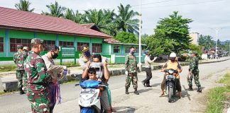 Peduli Dampak Corona, Tim Gabungan, TNI-Polri, PMI, Forkopincam Bangun Purba Bagi-Bagi Masker dan Sembako