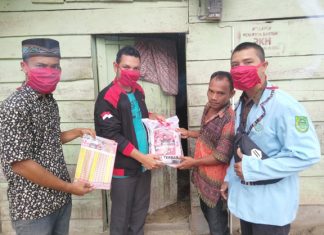 Pandemi Covid-19, Sekretaris DPC PDIP Rohul Bagikan Beras ke Masyarakat