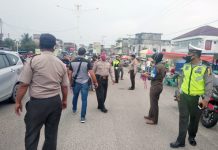 Polres Rohul dan Satpol PP Tegur Pengendara Tak Gunakan Masker