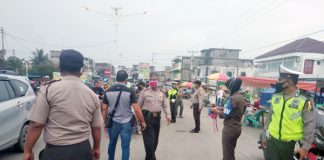 Polres Rohul dan Satpol PP Tegur Pengendara Tak Gunakan Masker