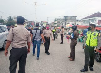 Polres Rohul dan Satpol PP Tegur Pengendara Tak Gunakan Masker