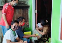 Lindungi Warga Dari Corona, Desa Rambah Hilir Bagi-Bagi Multivitamin dan Masker Gratis
