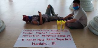 Desak Pemkab Rohul Sosialisasikan Perbup Anggaran Covid-19, Dua Pria Datangi Kantor Bupati Bawa Minyak Goreng