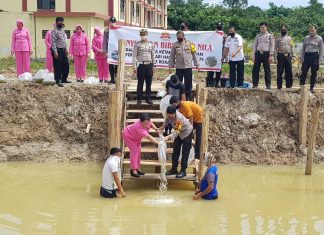 Jaga Ketahanan Pangan, Kapolres Rohul Gelar Menanam Pohon dan penyemaian Bibit Ikan