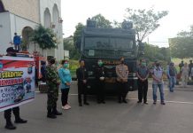 Kapolres Rokan Hulu Beserta Forkopimda Lakukan Penyemprotan Desinfektan