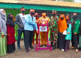 Kukerta UNRI Berikan TTG ke Koramil 02 Rambah