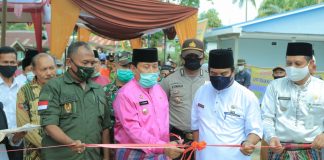 Bupati Rohul Saksikan Penyerahan BLT DD di Desa Pulo Raya