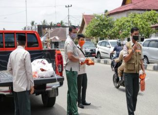 BPBD Rohul Bagikan 1000 Masker Gratis Ke Masyarakat