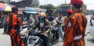Putus Penyebaran Covid-19, Pemuda Pancasila Bagi Masker Gratis