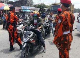 Putus Penyebaran Covid-19, Pemuda Pancasila Bagi Masker Gratis