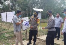 Lanjutkan Program Jaga Kampung, Kapolres Rohul Tebar 25 Ribu Bibit Ikan