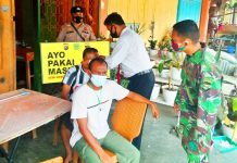 TNI POLRI di Rohul Kompak Beri Sosialisasi Prokes Secara “Door To Door”