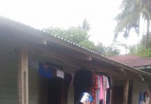Dukung Perangi Penyebaran Covid-19, Pemdes Lubuk Napal Semprot Disinfektan di Rumah Warga
