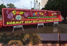 Dukung Penyelenggaraan PSU, Poros Muda Rohul Kirim “Surat Cinta” Dalam Bentuk Karangan Bunga