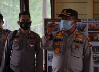 Tinjau Gerai Vaksin dan Posko PPKM, Kapolres Rohul Imbau Masyarakat Terapkan Prokes