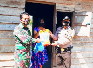 Bantu Masyarakat Ditengah Pandemi Covid-19, Babinsa dan Bhabinkamtibmas Bagi-Bagi Sembako