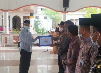 Pemkab Rohul Serahkan Bantuan Hibah Sebesar Rp 4 Miliar Lebih Untuk Tempat Ibadah dan Ponpes