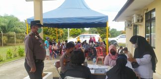 Polsek Tambusai Bersinergi Dengan PT GSM, Gelar Vaksinasi Massal