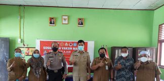 Bersinergi, Camat dan Polisi di Rohul Gelar Sosialisasi Vaksinasi Bagi Anak