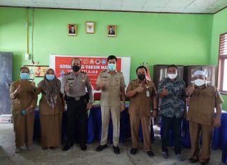 Bersinergi, Camat dan Polisi di Rohul Gelar Sosialisasi Vaksinasi Bagi Anak