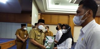 Bupati Rokan Hulu Serahkan SK Kepada CPNS dan PPPK Tahun 2021 di Lingkungan Pemkab Rohul