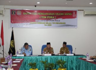 ASISTEN 1 SETDAKAB ROHUL BUKA RAPAT TIM PORA