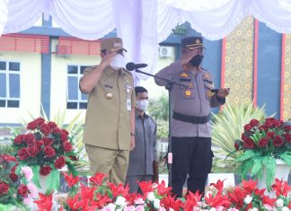 Didampingi Kapolres, Bupati Rohul Pimpinan Apel Gelar Pasukan Operasi Lilin LK 2022