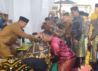 Potang Bolimau Kembali Dilaksanakan di Rohul, Wabup Bolimau Adat di Kecamatan Kepenuhan Hulu