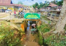 Antisipasi Banjir, TNI POLRI di Rohul Bersihkan Drainase