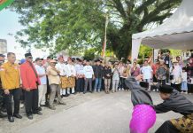 Berbalut Adat, Bacalon Anton-Poti Daftar Pilkada Rohul