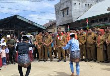 Hadiri Peringatan Hari Jadi Desa Rambah Hilir Timur, Bupati Anton Ajak Masyarakat Jaga Kekompakan