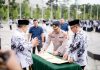 PGRI Provinsi Riau dan Kapolda Riau Tandatangani MoU untuk Perlindungan dan Pengamanan Profesi Guru
